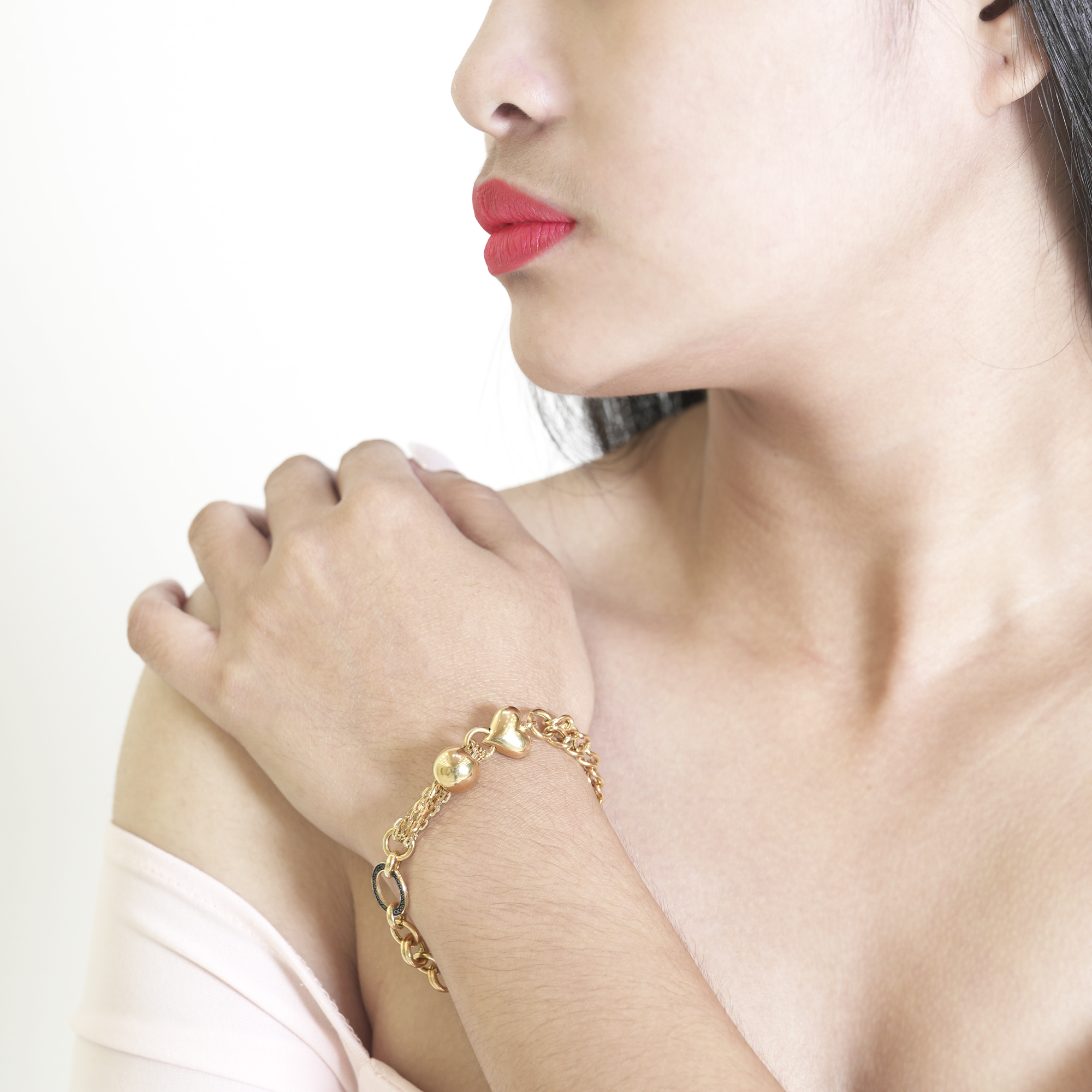 Polymnia Gold Charm Bracelet